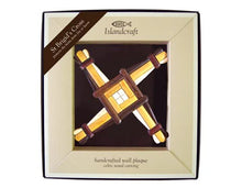 Load image into Gallery viewer, Handcrafted wall plaque with 'St. Brigid's Cross' design in a decorative box, featuring Islandcraft branding.