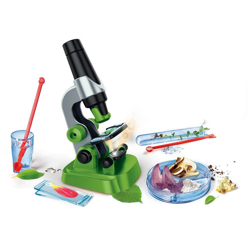 Toy microscope with accessories on a white background