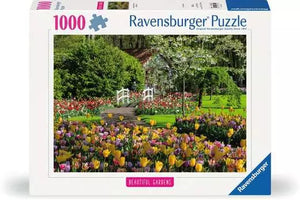 Ravensburger puzzle box with a garden scene and colorful flowers