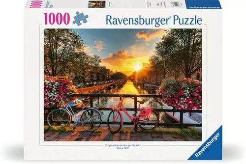 Ravensburger puzzle box with a scenic sunset over a canal and bicycles.