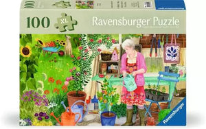 Ravensburger puzzle box with a woman in a garden setting