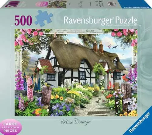 Ravensburger puzzle box with a scenic cottage and garden design.