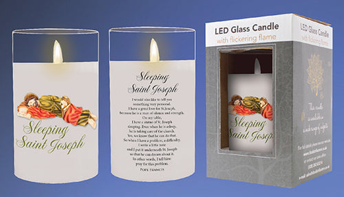LED glass candle with 'Sleeping Saint Joseph' text and packaging on a blue background