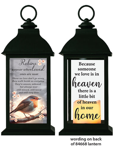 Black lantern with inspirational messages on a white background