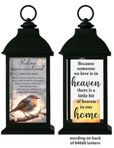 Black lantern with inspirational messages on a white background